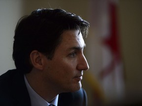 Prime Minister Justin Trudeau takes part in a round table discussion with