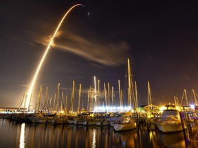 In this image made with an 8-minute long exposure the SpaceX Falcon 9 rocket launches from Cape Canaveral Air Force Station in Port Canaveral, Fla., Sunday, Jan. 7, 2018.