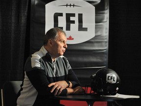 Commissioner Randy Ambrosie speaks to the press at the CFL's annual winter meetings in Banff, Alta., on Jan. 10.