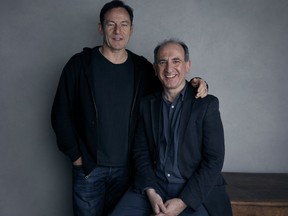 Jason Isaacs, left, and writer/director Armando Iannucci pose for a portrait to promote the film, "The Death of Stalin," at the Music Lodge during the Sundance Film Festival on Sunday, Jan. 21, 2018, in Park City, Utah.