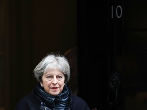 British Prime Minister Theresa May leaves number 10 Downing Street to attend a weekly questions and answers session in Parliament on Wednesday, Jan. 10, 2018.