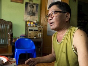 In this Jan. 5, 2018, photo, activist Nyo Tun speaks during a meeting at his residence in Yangon, Myanmar. Nyo Tun spent 10 years as a political prisoner locked away by Myanmar's military in the notorious Insein prison, where he endured beatings and other cruelty for his efforts to bring democracy.  Myanmar's military, once despised for its stranglehold on the country, has seen its popularity surge alongside a rise in nationalism that has accompanied a crackdown on Rohingya Muslims.