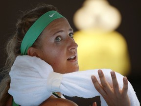 FILE - In this Jan. 27, 2016, file photo, Victoria Azarenka of Belarus wraps an ice towel around her neck during a break in her quarterfinal match against Angelique Kerber of Germany at the Australian Open tennis championships in Melbourne, Australia. Two-time champion Azarenka has withdrawn from the 2018 Australian Open, with her wildcard entry to the season's first major reallocated to Ajla Tomljanovic, Australian Open organizers announced in a social media post Monday, Jan. 8, 2018, a week before the tournament begins.