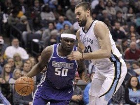 Sacramento Kings forward Zach Randolph (50) drives against Memphis Grizzlies center Marc Gasol (33) during the first half of an NBA basketball game Friday, Jan. 19, 2018, in Memphis, Tenn.