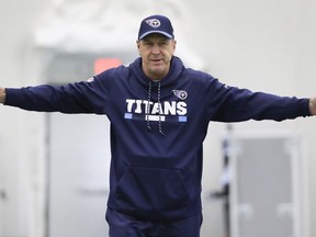 Tennessee Titans head coach Mike Mularkey stretches during an NFL football practice Tuesday, Jan. 2, 2018, in Nashville, Tenn. The Titans are scheduled to play the Kansas City Chiefs Saturday in an AFC wild-card playoff game.