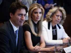 From left, Canadian Prime Minister Justin Trudeau, Ivanka Trump, daughter of President Donald Trump, and TransAlta CEO Dawn Farrell listen during a meeting with women business leaders in the Cabinet Room of the White House in Washington