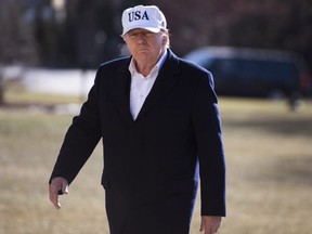 U.S. President Donald Trump returns from a weekend trip with Republican leadership to Camp David, on the South Lawn of the White House in Washington, D.C., U.S., on Sunday, Jan. 7, 2018. Trump's allies turned out in force Sunday to defend the president from assertions in a new book that he's seen by aides and confidants as unfit for office.