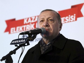 Turkey's President Recep Tayyip Erdogan speaks at an event in Ankara, Turkey, Monday, Jan. 15, 2018.   Erdogan accused its NATO ally, the United States of forming a "terrorist force" at Turkey's border, and vowed to "drown" the new 30,000-strong border security force.