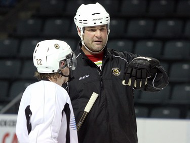 Eric Lindros helps out at Kingston Frontenacs practice on Dec. 31, 2011.
