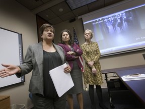 FILE - In this Feb. 16, 2017 file photo, El Paso County Attorney Jo Anne Bernal, left, answers a question in El Paso, Texas, as County Judge Veronica Escobar and Center Against Sexual and Family Violence Executive Director Stephanie Karr listen as the three take questions from local media concerning the arrest of Irvin Gonzalez at a courthouse. The transgender woman was obtaining a protective order against an abusive boyfriend when she was detained, drawing national attention to the issue of courthouse arrests by immigration agents. Federal immigration authorities announced Wednesday, Jan. 31, 2017 that agents will enter courthouses only to capture specific targets, like convicted criminals, gang members, public safety threats and immigrants who have been previously deported or ordered to leave.