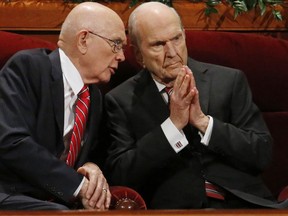 FILE - In this Sept. 30, 2017, file photo, Dallin H. Oaks, left, and Russell M. Nelson, members of a top governing body called the Quorum of the Twelve Apostles of The Church of Jesus Christ of Latter-day Saints conference of the two-day Mormon church conference, in Salt Lake City. President Thomas S. Monson, of The Church of Jesus Christ of Latter-day Saints, the 16th president of the Mormon church, died Tuesday, Jan. 2, 2018, after nine years in office. He was 90. The next president was not immediately named, but the job is expected to go to next longest-tenured member of the church's governing Quorum of the Twelve Apostles, Nelson, per church protocol.