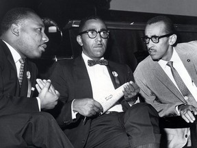 In a Sept. 25, 1963 photo, The Rev. Martin Luther King,Jr., left, VP Joseph E. Lowery, and Wyatt Tee Walker, right, executive director of the SCLC meet at First African Baptist Church, for the SCLC convention in Richmond, Va. The Rev. Wyatt Tee Walker, who helped assemble the Rev. Martin Luther King Jr.'s famous "Letter From Birmingham Jail" from notes the incarcerated King wrote on paper scraps and newspaper margins, died Tuesday morning, Jan. 23, 2018, in Chester, Va., said his daughter Patrice Walker Powell. He was either 88 or 89. Family records showed different years of birth, said Powell, who confirmed his death.
