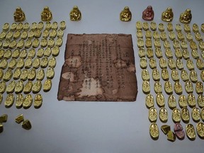 Fake gold artifacts are shown in a handout photo supplied by Richmond, B.C. RCMP. THE CANADIAN PRESS/HO-Richmond RCMP MANDATORY CREDIT
