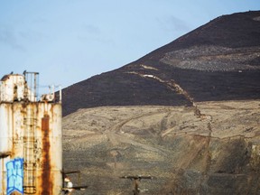 FILE - In this Jan. 3, 2018, file photo, a crack in Rattlesnake Ridge is seen extending from a gravel pit up and across the ridge near Union Gap, Wash. The threat has forced evacuations as officials prepare for what they say is inevitable – the collapse of the ridge near an interstate highway that experts say should occur sometime from late January or early February.