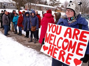 Supporters show their solidarity with a local Muslim community in Peterborough, Ont., following the fatal attack on the Centre Culturel Islamique de Québec in Quebec City on Jan. 29, 2017.