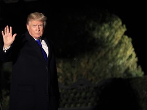 President Donald Trump waves as he leaves the White House in Washington, Wednesday, Jan. 24, 2018, enroute to Davos, Switzerland, to attend the World Economic Forum. Trump is ready to play salesman as he heads to an economic summit in the Swiss Alps, making the case that his "America First" agenda can go hand-in-hand with global cooperation.