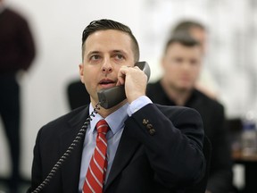 FILE - In this April 28, 2016, file photo, Green Bay Packers' Eliot Wolf, director of football operations, makes a phone call inside the war room during the 2016 NFL Football draft at Lambeau Field in Green Bay, Wis. New Browns general manager John Dorsey has added former Green Bay executive Eliot Wolf and Alonzo Highsmith to his revamped front office. Wolf interviewed on Tuesday, Jan. 9, 2018, with Dorsey, who came to Cleveland last month after Browns owner Jimmy Haslam fired vice president Sashi Brown.