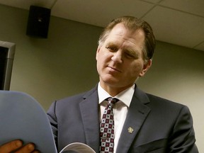 FILE - In this Dec. 12, 2016, file photo, Wisconsin Elections Commission administrator Michael Haas views the results of a state-wide presidential recount at the commission's offices in Madison, Wisc. The embattled leaders of the Wisconsin agencies that run elections and enforce ethics laws are engaging in a public relations campaign to save their jobs. The Wisconsin Senate was scheduled to vote Tuesday, Jan. 23, 2018 on whether to confirm the administrators of the state agencies that run elections and oversee ethics laws that office holders, candidates and lobbyists have to follow.