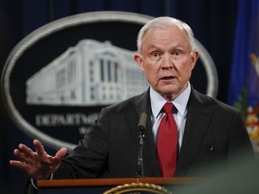 FILE - In this Dec. 15, 2017 file photo, Attorney General Jeff Sessions speaks during a news conference at the Justice Department in Washington.  Sessions on Friday launched a review of a little-known but widely used practice of immigration judges closing cases without decisions, potentially reshaping immigration courts and putting hundreds of thousands of people in greater legal limbo.