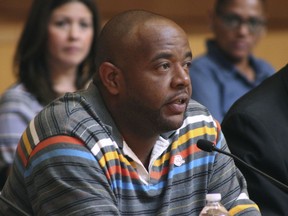 FILE - In this June 20, 2017, file photo, Robert Mickens, whose 15-year-old daughter, Nisa Mickens was killed in an alleged MS-13 killing last September, speaks at a hearing of the House Subcommittee on Terrorism and Intelligence at the U.S. District Courthouse in Central Islip, N.Y. President Donald Trump's guests for his State of the Union speech will include the parents of two Long Island teenagers who were believed to be killed by MS-13 gang members.