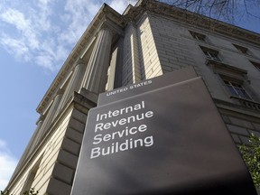 FILE - In this photo March 22, 2013, file photo, the exterior of the Internal Revenue Service (IRS) building in Washington. There's plenty that won't get done if thousands of federal employees are barred from working until dysfunctional Washington agrees on a plan to restore funding.