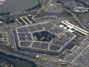 FILE - In this June 3, 2011, file photo, the Pentagon is seen from air from Air Force One. The Pentagon has ordered an independent federal auditor to stop providing the public with key information about U.S. war efforts in Afghanistan, accelerating a clampdown on data, such as the size of the Afghan military and police forces, that indicate how the 16-year-old stalemated war is going.