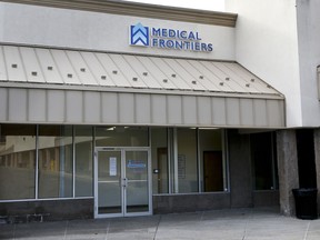 In this Dec. 21, 2017, photo, a notice stating the license to practice medicine for Dr. Andrzej Zielke has been suspended, is posted on the door at the closed Medical Frontiers office in Gibsonia, Pa. The Justice Department is giving federal prosecutors in 12 regions ravaged by the opioid abuse epidemic a trove of data officials say will help them stop over-prescribing doctors. But some experts say doctors are just a small part of a problem that won't be cured without prevention and treatment.