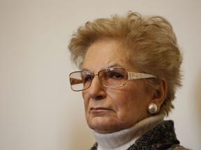 FILE - In this file photo taken in Milan, Italy, on Jan. 26, 2011, Holocaust survivor Liliana Segre attends a news conference on the occasion of an Holocaust remembrance. President Sergio Mattarella's office on Friday, Jan. 19, 2018 said he was making Liliana Segre senator-for-life because she had made the nation proud. For decades, Segre, now 87, was reluctant to discuss her time in Auschwitz. But in the 1990s, she began speaking to schoolchildren throughout Italy about the Holocaust.