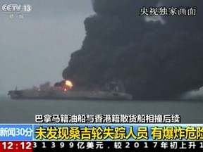 In this image from video run by China's CCTV shows the Panama-registered tanker "Sanchi" is seen ablaze after a collision with a Hong Kong-registered freighter off China's eastern coast, Monday, Jan. 8, 2017. The U.S. Navy has joined the search for 32 crew members missing from the oil tanker that caught fire after colliding with a bulk freighter off China's east coast. (CCTV via AP Video)