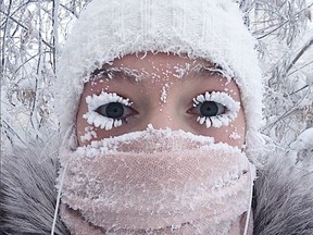 In this photo taken on Sunday, Jan. 14, 2018, Anastasia Gruzdeva poses for selfie as the Temperature dropped to about -50 degrees (-58 degrees Fahrenheit) in Yakutsk, Russia. Temperatures in the remote, diamond-rich Russian region of Yakutia have dropped to near-record lows, plunging to -67 degrees Centigrade (-88.6 degrees Fahrenheit) in some areas.