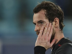 Great Britain's Andy Murray reacts after he lost a match to Spain's Roberto Bautista Agut during the second day of the Mubadala World Tennis Championship in Abu Dhabi, United Arab Emirates, Friday, Dec. 29, 2017.