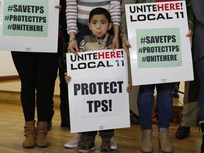 In this Monday, Jan. 8, 2018 photo, Mateo Barrera, 4 originally from El Salvador, whose family members benefit from Temporary Protected Status, TPS, attends a news conference in Los Angeles. This week's news that the Trump administration is ending TPS for 200,000 migrants from El Salvador is also rattling nerves in neighboring Honduras. A decision on the fate of more than 50,000 Hondurans living in the United States under TPS is expected in July, and it could have severe social, economic and political consequences for the Central American nation.