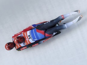 Germany's Tobias Wendl und Tobias Arlt compete in the doubles luge World Cup race at Lake Koenigssee, Germany, Saturday, Jan. 6, 2018.