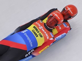 Germany's Toni Eggert, and Sascha Benecken compete during the men's doubles race at the Luge World Cup in Oberhof, Germany, Saturday, Jan. 13, 2018.