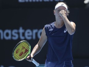 Daria Gavrilova of Australia points to her head while playing compatriot Ash Barty during their women's semifinal singles match at the Sydney International tennis tournament in Sydney, Friday, Jan. 12, 2018.