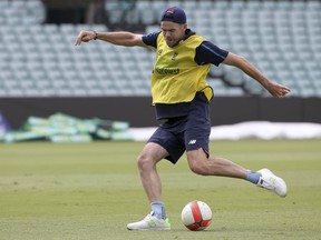 England's James Anderson kicks a soccer ball during training for their Ashes cricket test match against Australia in Sydney, Wednesday, Jan. 3, 2018. The test begins on Thursday.