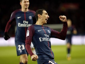 PSG's Angel Di Maria celebrates after scoring during his French League One soccer match between Paris-Saint-Germain and Dijon, at the Parc des Princes stadium in Paris, France, Wednesday, Jan. 17, 2018.