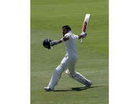 India's captain Virat Kohli, celebrates his century during the third day of the second cricket Test match between South Africa and India at Centurion Park in Pretoria, South Africa, Monday, Jan. 15, 2018.
