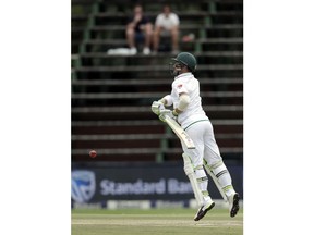 South Africa's batsman Dean Elgar in action on the fourth day of the third cricket test match between South Africa and India at the Wanderers Stadium in Johannesburg, South Africa, Saturday, Jan. 27, 2018.