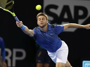 Ryan Harrison of the U.S. plays a shot in his final match against Nick Kyrgios of Australia during the Brisbane International tennis tournament in Brisbane, Australia, Sunday, Jan. 7, 2018.