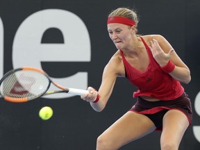 Kristina Mladenovic of France plays a shot in her match against Aliaksandra Sasnovich of Belarus, during the Brisbane International tennis tournament in Brisbane, Australia, Monday, Jan. 1, 2018.