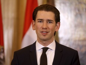 FILE - In this Jan. 1, 2018 file photo, Austrian Chancellor Sebastian Kurz talks at a joint news conference with Dutch Prime Minister Mark Rutte at the federal chancellery in Vienna. Austria's new chancellor is rejecting suggestions that his government will align broadly with eastern nations that have clashed with the European Union over migrants and other issues. Kurz warned Friday Jan. 5, 2018  against "over-interpreting things."