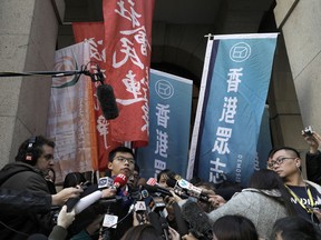 Pro-democracy young activist Joshua Wong talks to reporters in front of the Court of Final Appeal Hong Kong, Tuesday, Jan. 16, 2018. Three young Hong Kong activists, Wong, Nathan Law and Alex Chow, are making a last-ditch attempt to overturn prison sentences for their roles in sparking 2014's massive pro-democracy protests in the semiautonomous Chinese city.