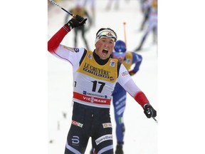 Norway's Emil Iversen celebrates after winning the 15km mass start of the Tour de Ski cross country skiing, in Oberstdorf, Germany, Thursday, Jan. 4, 2018.