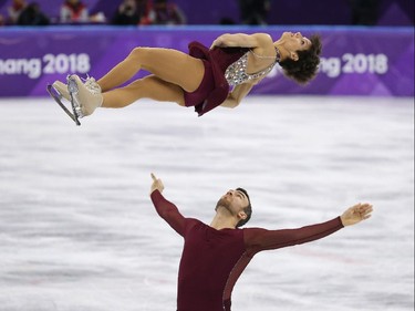 Meagan Duhamel and Eric Radford, bronze in pairs figure skating.