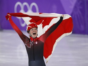 Kim Boutin celebrates her bronze medal in the women's 1,500 metres at the Pyeongchang Olympics on Feb. 17.