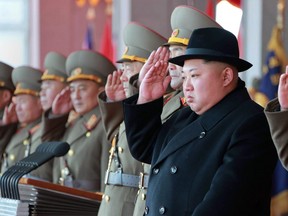 This photo taken on February 8, 2018 and released on February 9, 2018 by North Korea's official Korean Central News Agency (KCNA) shows North Korean leader Kim Jong-Un attending a military parade to mark the 70th anniversary of the Korean People's Army at Kim Il Sung square in Pyongyang.