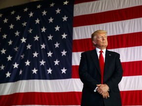 President Donald Trump is introduced to speak to U.S. military troops at Naval Air Station Sigonella.