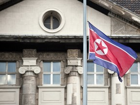 The flag of the Democratic Republic of Korea flies in front of the embassy in Berlin December 19, 2011.