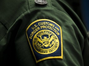 A  U.S. Customs and Border Protection patch is displayed on the sleeve of Ronald D. Vitiello, Acting Deputy Commissioner of U.S. Customs and Border Protection.